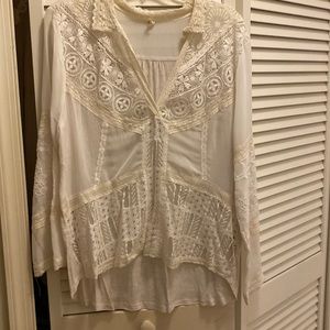 Delicate lace ivory high low top. Brand is Tiny from Anthropologie, size XL.